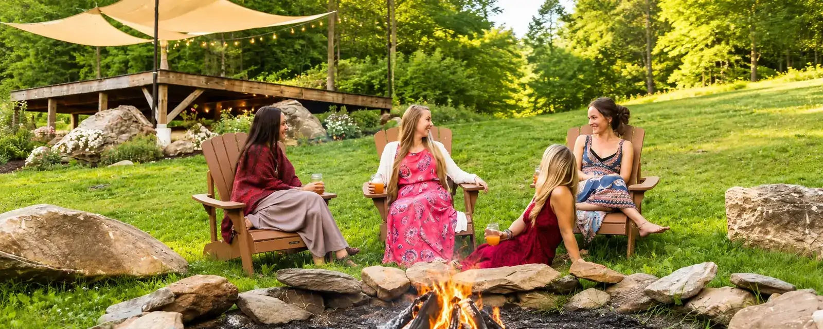 A relaxed summer gathering in Adirondack chairs on a green lawn by the cabin